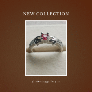 Silver Ring with Brilliant Red Gemstone and Sparkling Accents